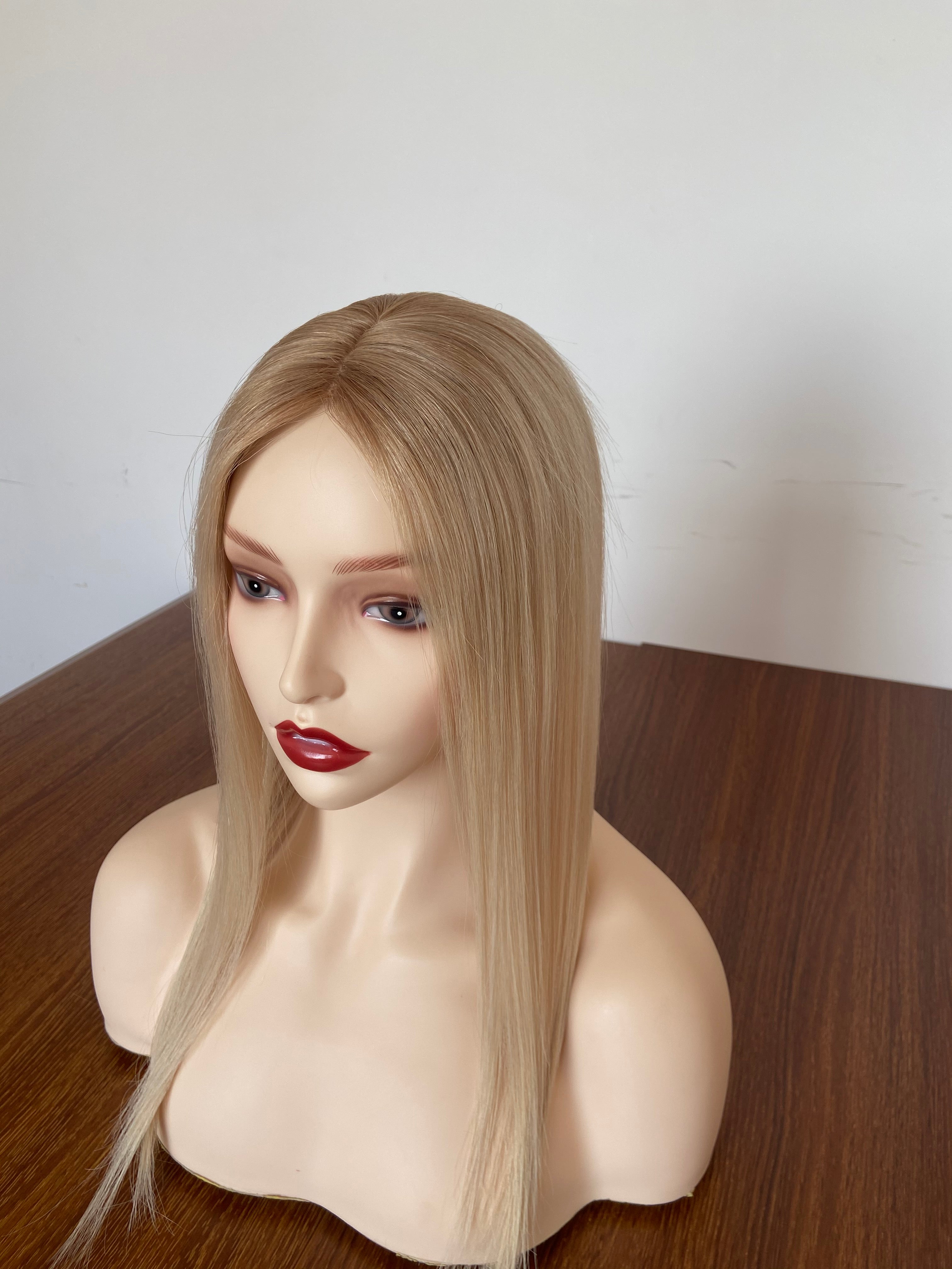 Hairpiece/topper platinum with a slightly dark base made of human hair