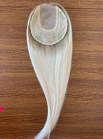 Hairpiece/topper platinum with a slightly dark base made of human hair